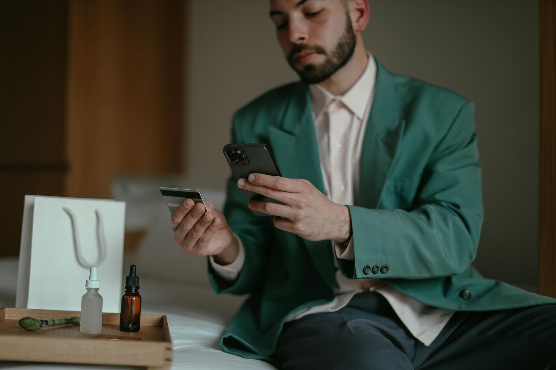 A man using her credit card for his purchase online